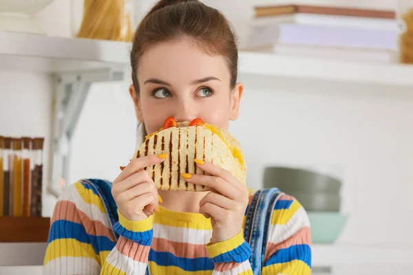 Beautiful Young Woman Eating Tasty Quesadilla Home — Stock Photo, Image