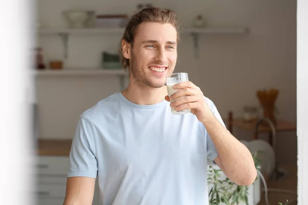 Young Man Drinking Fresh Milk Home — Stock Photo, Image