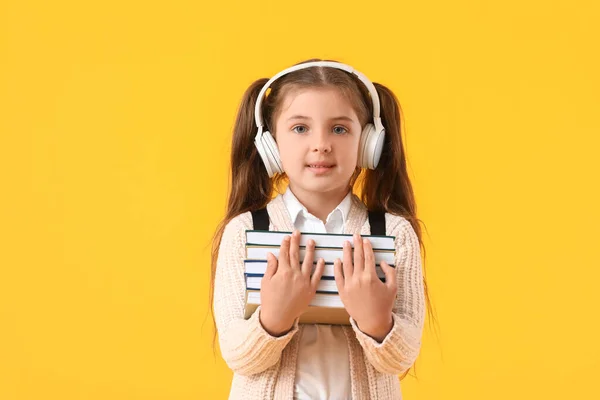 Cute Little School Girl Books Headphones Color Background — Stock Photo, Image