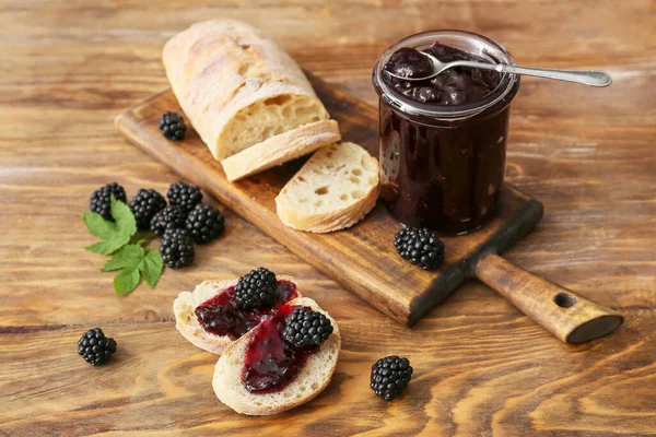 Jar Tasty Blackberry Jam Sandwiches Wooden Background — Stock Photo, Image