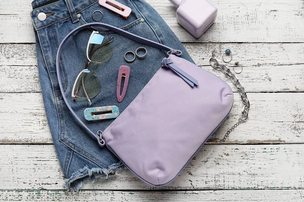 Trendy Handbag Jeans Skirt Different Accessories Light Wooden Background — Stock Photo, Image