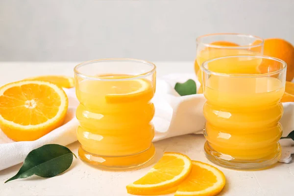 Glasses Tasty Orange Juice Light Background Closeup — Stock Photo, Image