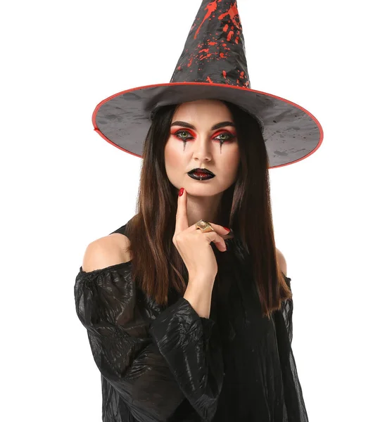 白い背景にハロウィンのための魔女として身に着けている美しい女性 — ストック写真