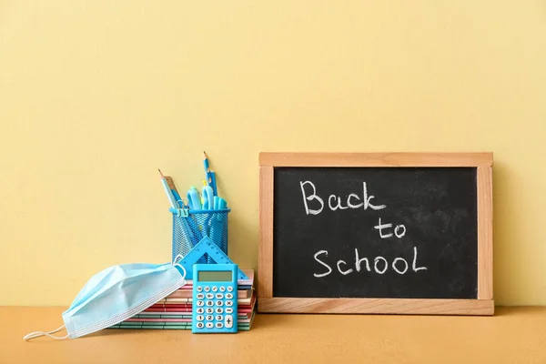 Chalkboard Text Back School Set Stationery Medical Mask Color Background — Stock Photo, Image