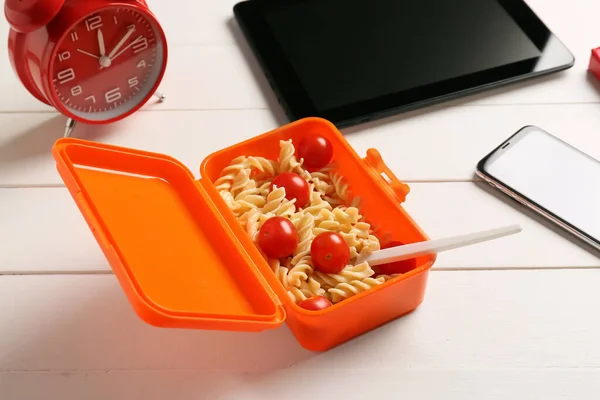 Lunch Box Tasty Pasta Alarm Clock Mobile Phone Tablet Computer — Stock Photo, Image