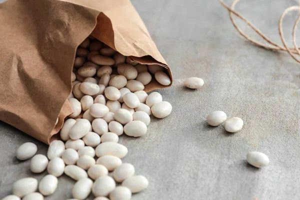 Paper Bag Raw Beans Grunge Background Closeup — Stock Photo, Image