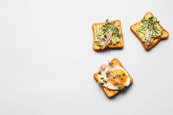 Tasty Toasts Avocado Fried Egg Micro Green White Background — Stock Photo, Image