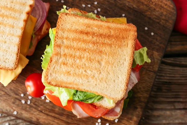 Board Tasty Sandwiches Wooden Background Closeup — Stock Photo, Image