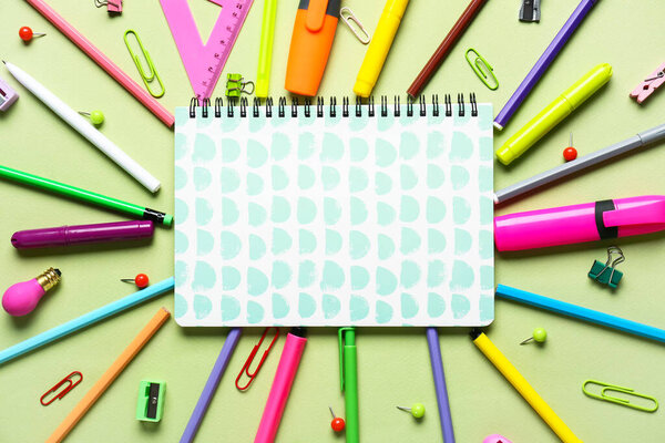 Stationery supplies on color background