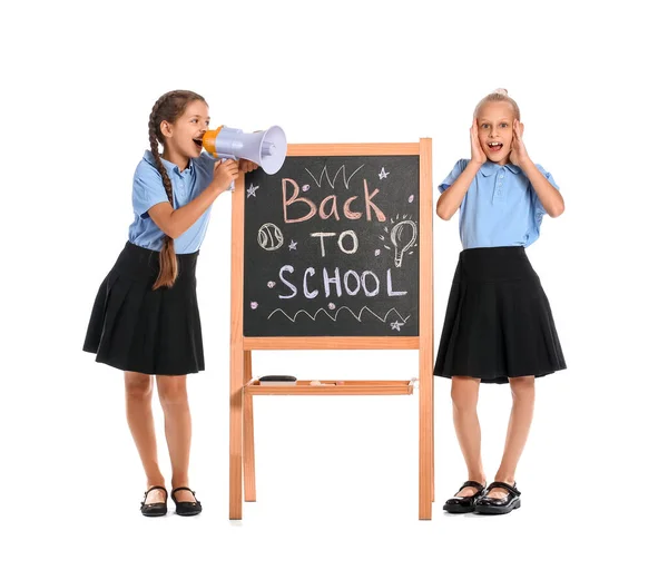 Schoolgirl Megaphone Shouting Her Classmate Chalkboard White Background — 스톡 사진