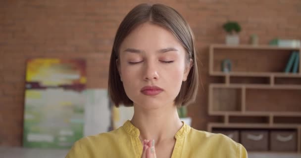 Beautiful Young Woman Meditating Home — Stock Video