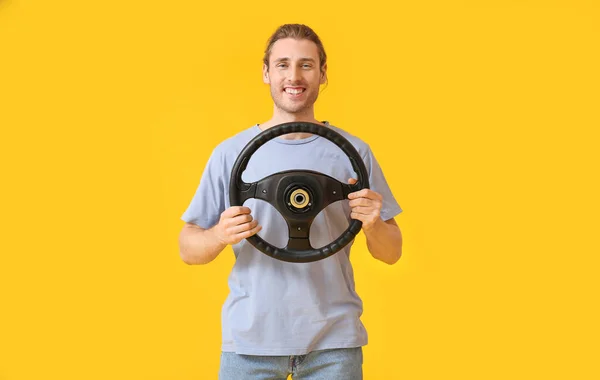 Young Man Steering Wheel Color Background — Stock Photo, Image