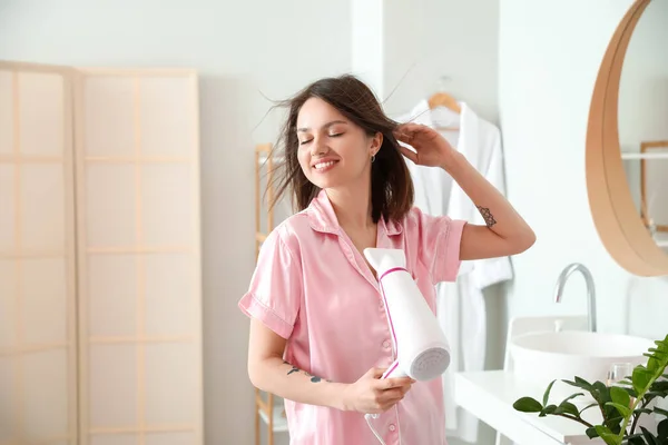Young Woman Blow Drying Her Hair Bathroom — Stock Photo, Image