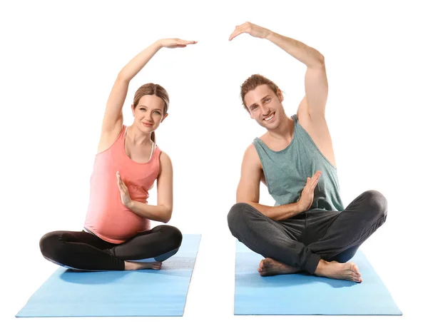 Joven Embarazada Marido Practicando Yoga Sobre Fondo Blanco —  Fotos de Stock