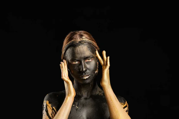 Beautiful Young Woman Black Golden Paint Her Body Dark Background — Stock Photo, Image