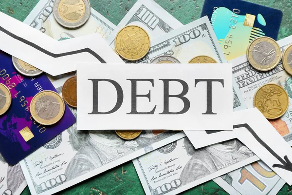 Бумага Словом Debt Деньги Цветном Фоне — стоковое фото