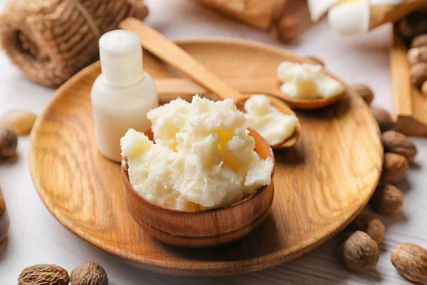 Composición Con Cuenco Manteca Karité Frutos Secos Botella Producto Cosmético —  Fotos de Stock