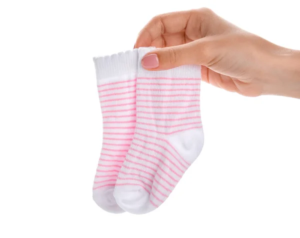 Frau Hält Baby Socken Auf Weißem Hintergrund — Stockfoto