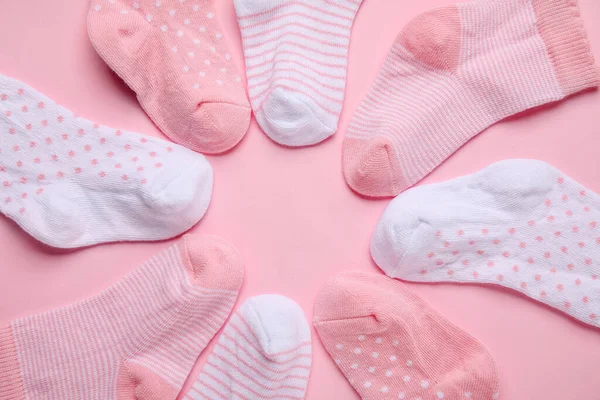 Frame Made Different Baby Socks Color Background Closeup — Stock Photo, Image