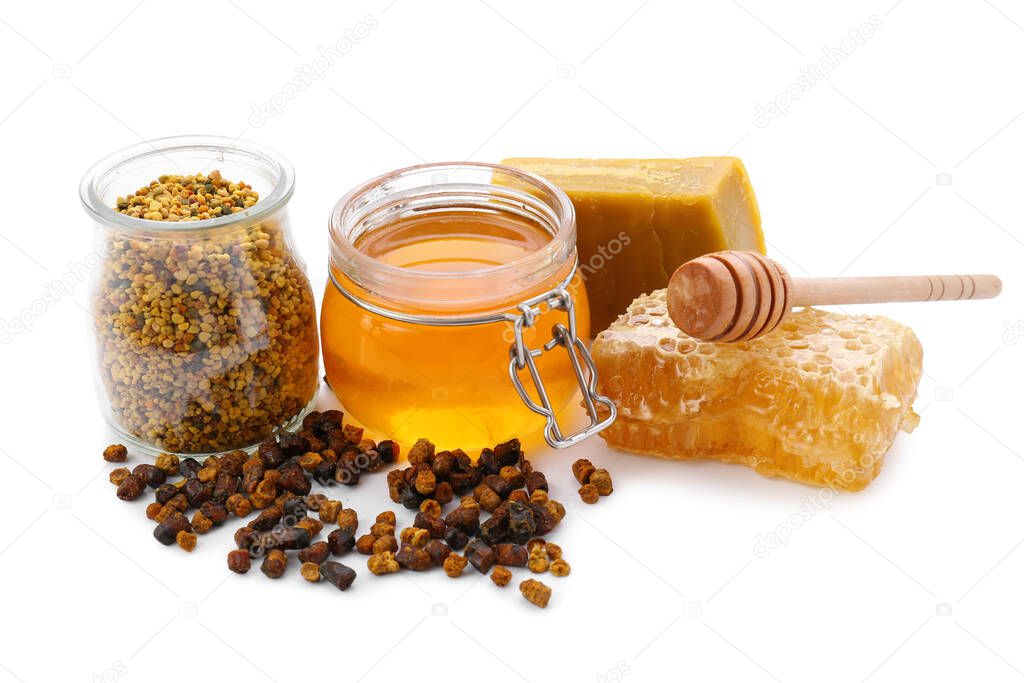 Different bee products on white background