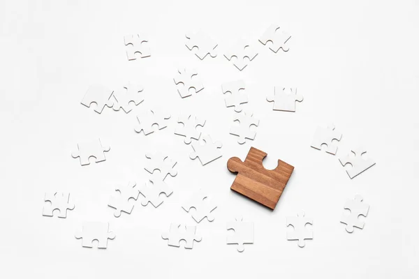 Wooden Puzzle Piece Blank Ones White Background Concept Uniqueness — Stock Photo, Image