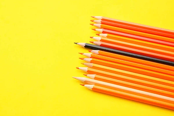 Black Pencil Orange Ones Color Background Concept Uniqueness — Stock Photo, Image