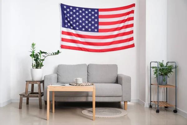 stock image Interior of stylish living room with USA flag