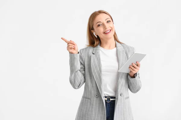 Mature Woman Tablet Computer Pointing Something White Background — Stock Photo, Image