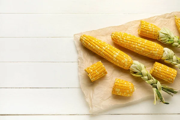 Fresh Corn Cobs Parchment White Wooden Table — Stock Photo, Image