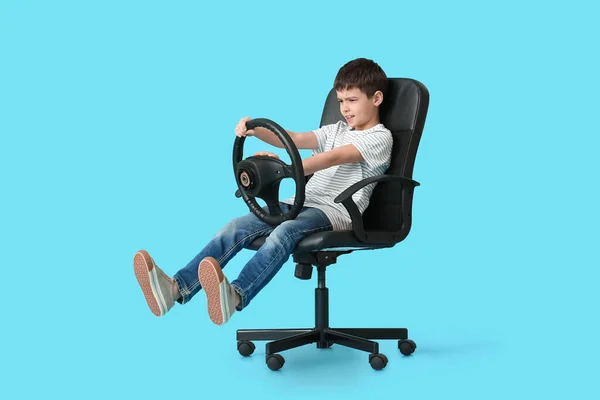 Little Boy Steering Wheel Sitting Chair Color Background — Stock Photo, Image