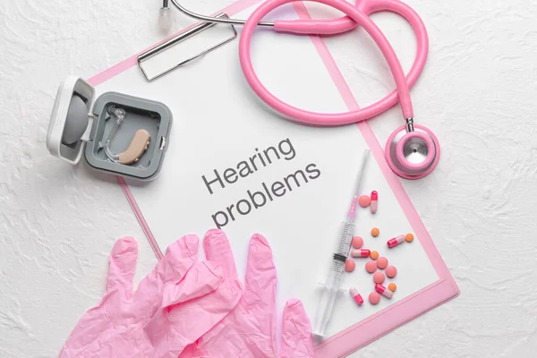 Clipboard Text Hearing Problems Stethoscope Gloves White Background — Stock Photo, Image