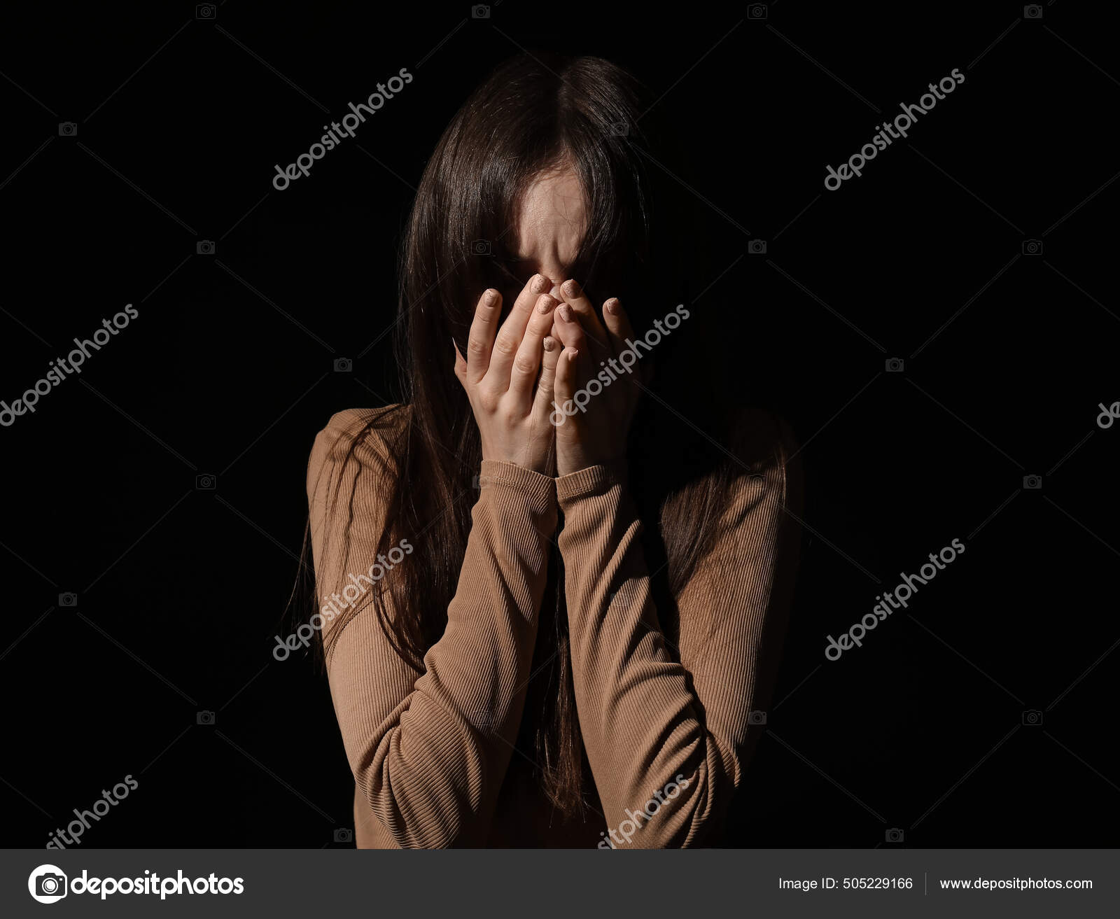 Woman Gets Scared By The Dark In Front Of Her Face Background