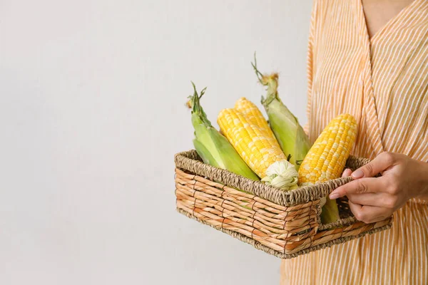 Woman Holding Basket Fresh Corn Cobs Light Background — Stock Photo, Image