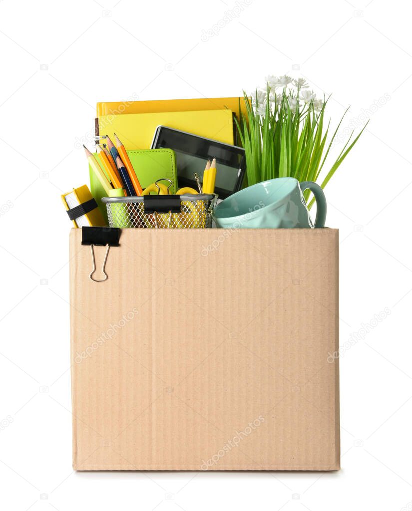 Box with personal stuff on white background. Concept of dismissal