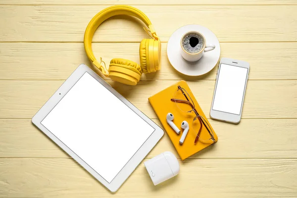 Different Modern Devices Cup Coffee Eyeglasses Color Wooden Background — Stock Photo, Image