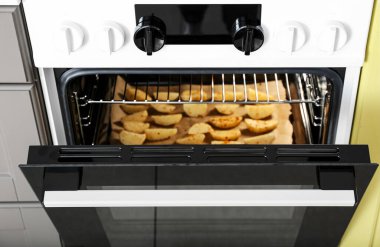 Mutfakta patatesli elektrikli fırın, yakın plan.