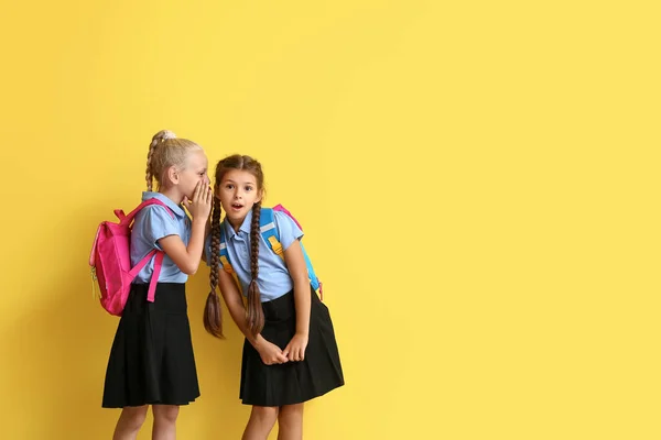 Cute Gossiping Schoolgirls Color Background — Stock Photo, Image