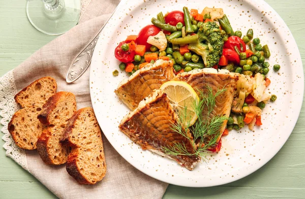 Plate Tasty Baked Cod Fillet Vegetables Bread Color Wooden Background — Stock Photo, Image
