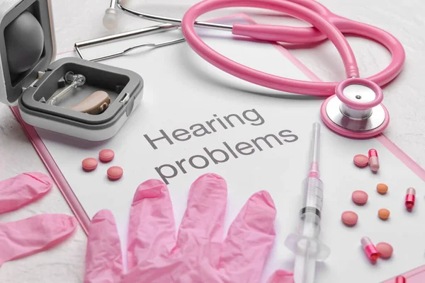 Clipboard Text Hearing Problems Stethoscope Gloves White Background — Stock Photo, Image