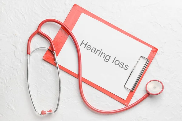 Clipboard Text Hearing Loss Stethoscope White Background — Stock Photo, Image