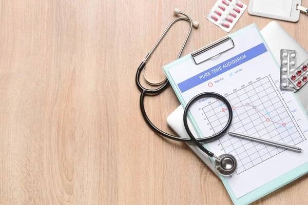 Audiogram Stethoscope Pills Light Wooden Background — Stock Photo, Image