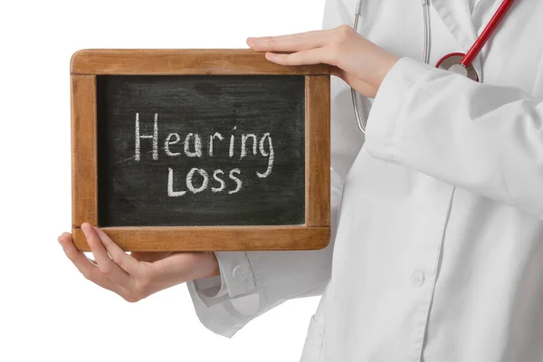 Female Doctor Holding Board Text Hearing Loss White Background — Stock Photo, Image