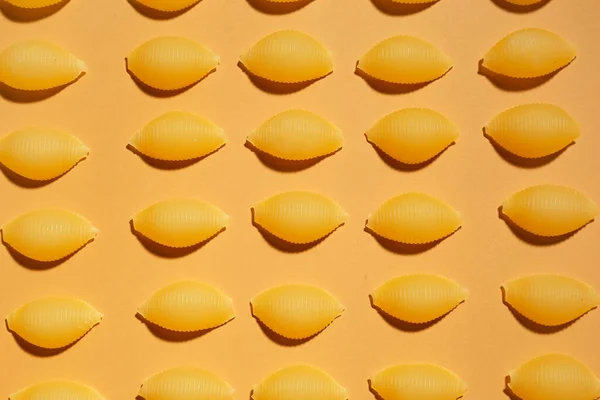 Uncooked Conchiglioni Pasta Color Background — Stock Photo, Image