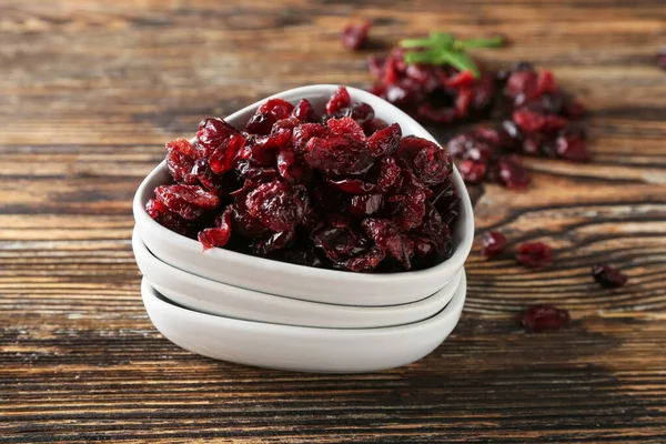 Bowl Tasty Dried Cranberries Wooden Background Closeup — Stock Photo, Image