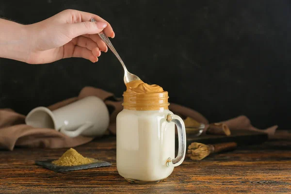 Woman Stirring Tasty Dalgona Hojicha Latte Table — Stock Photo, Image