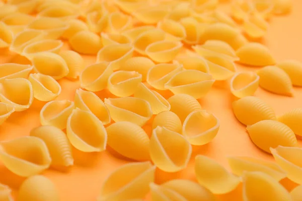 Uncooked Conchiglioni Pasta Color Background — Stock Photo, Image