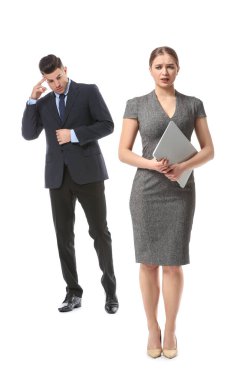 Boss looking at butt of his secretary on white background. Concept of harassment