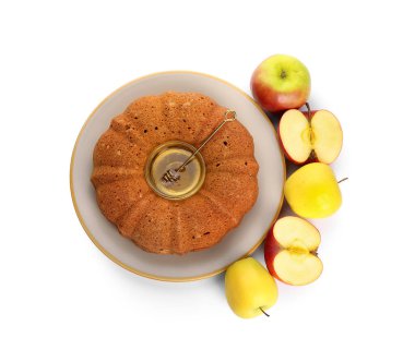 Beyaz arka planda bal ve elmalı ekmek. Rosh hashanah (Yahudi Yeni Yılı) kutlaması