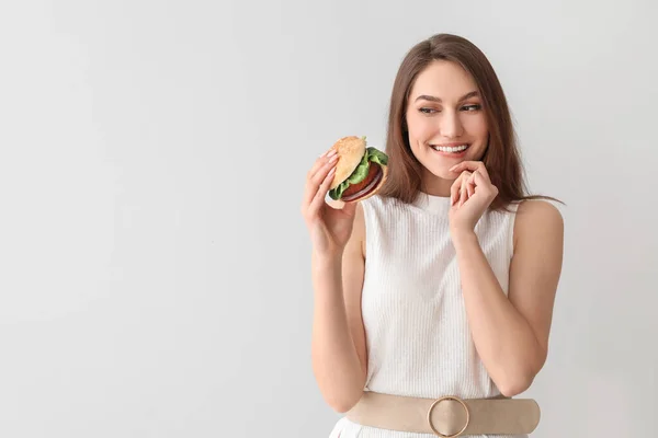 Beautiful Young Woman Tasty Vegan Burger Light Background — Stock Photo, Image