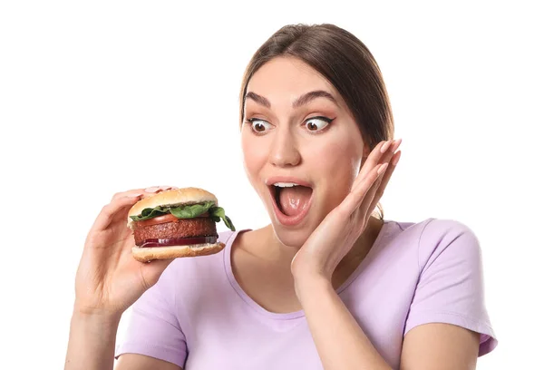 兴奋的年轻女人 带着美味的白底素食汉堡 — 图库照片